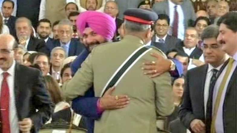 Siddhu hugs Bajwa